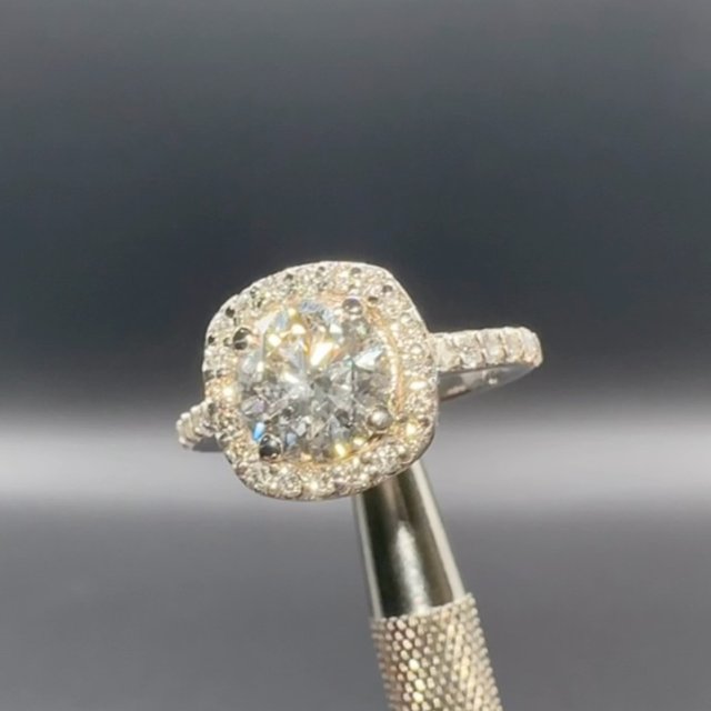 The kind of sparkle that speaks for itself — halo ring in white gold
