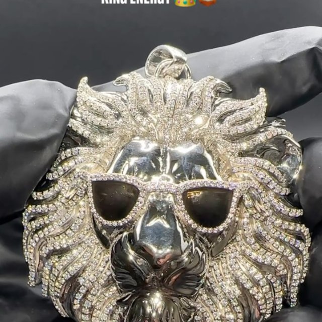 Wear your confidence — iced-out lion pendant