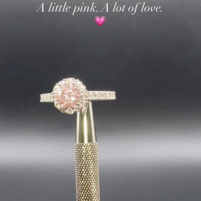 A ring as unique as your love story — pink centre stone halo